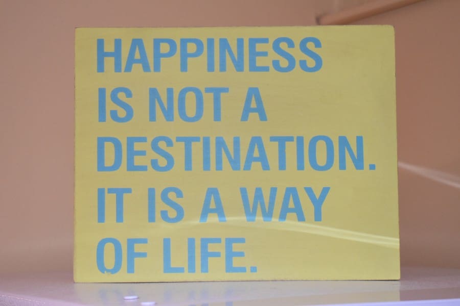 Decorative sign hanging in Muffy Ruben's career counselor practice